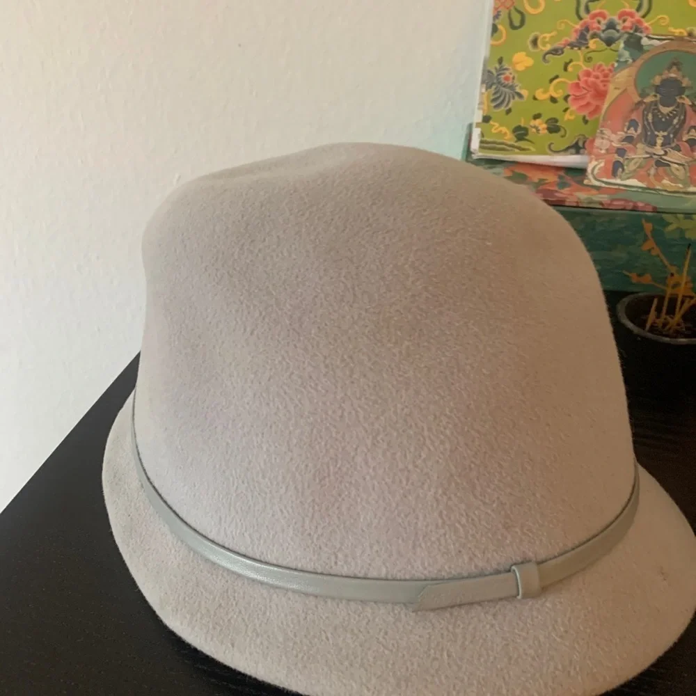 Gray Tango asymmetrical hat minor scuffing